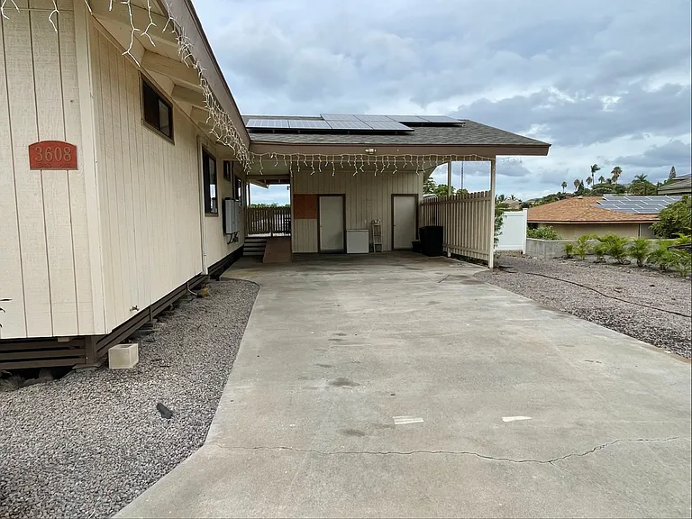 Carport with laundry room and separate office