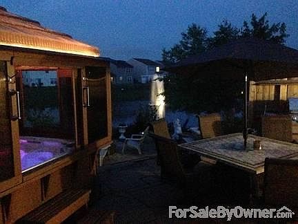 From the side entry
						:
						Looking to the fountain past the hot tub