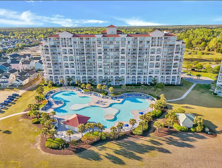 A great aerial view of the North Tower Pool located at the front of Barefoot Resort - just a few minutes from the condo. The hot tub is located under the red roof by the pool.