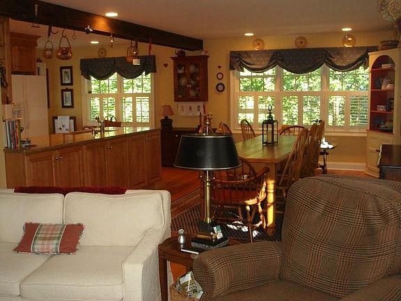 View from Living room to Dining room and
        Kitchen