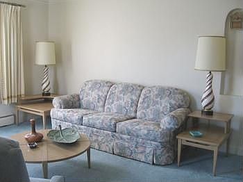 Pleasant living room...hardwood floor under carpet