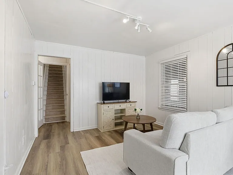 The home offers a refined, minimalist feel with a focus on simplicity and function.