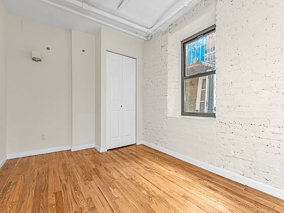5th image of 318 E 11th St APT 1