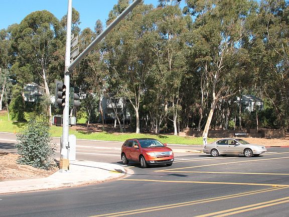 sitting at nearby intersection...looking toward back of condos...