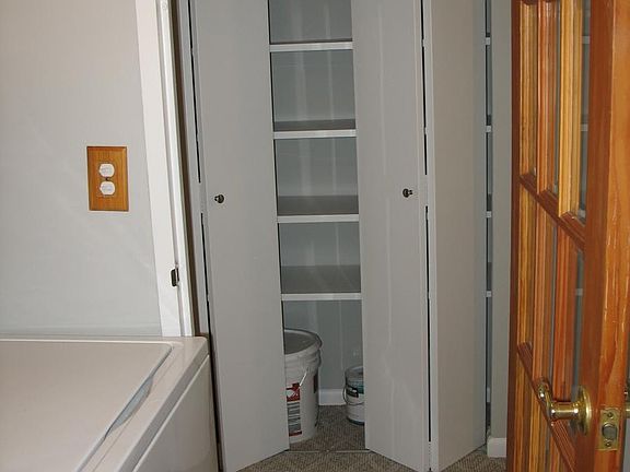 washer/dryer area facing pantry