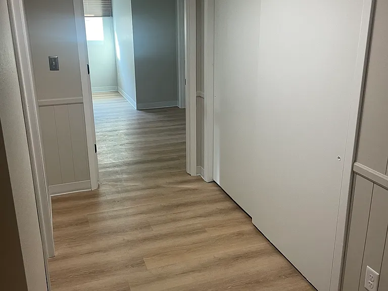 Hallway into bedroom and office suite