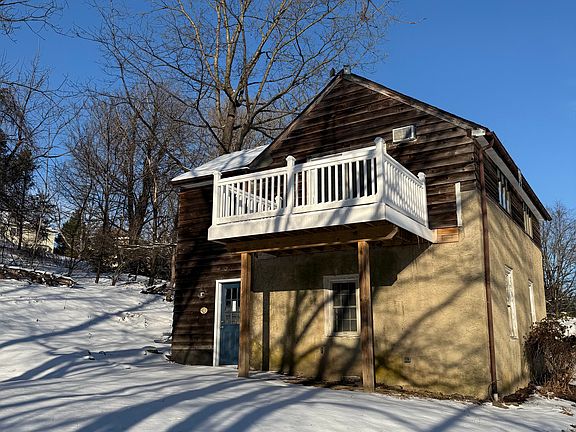 Back of house with parking.