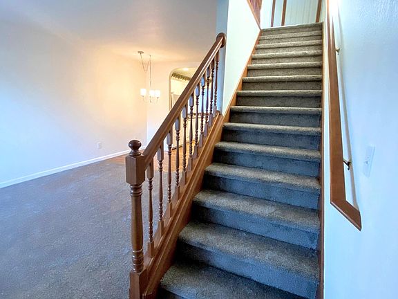Entry with view of Stairs