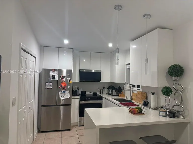 945 NE 33rd Ter #201 — Photo 1
