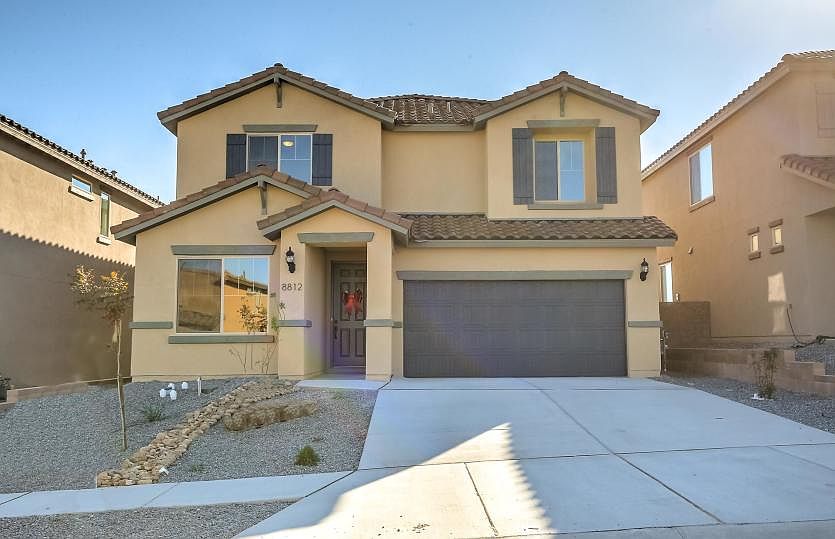 The Fifth Avenue is a two story spacious home with two garages and beautiful tile roofing.