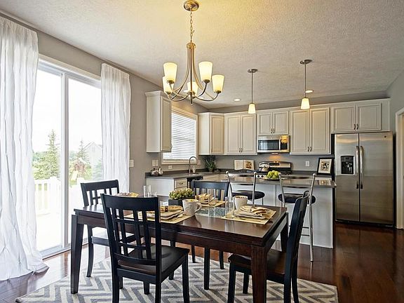 Floor plans and photos shown may include base features along with additional options and upgrades.