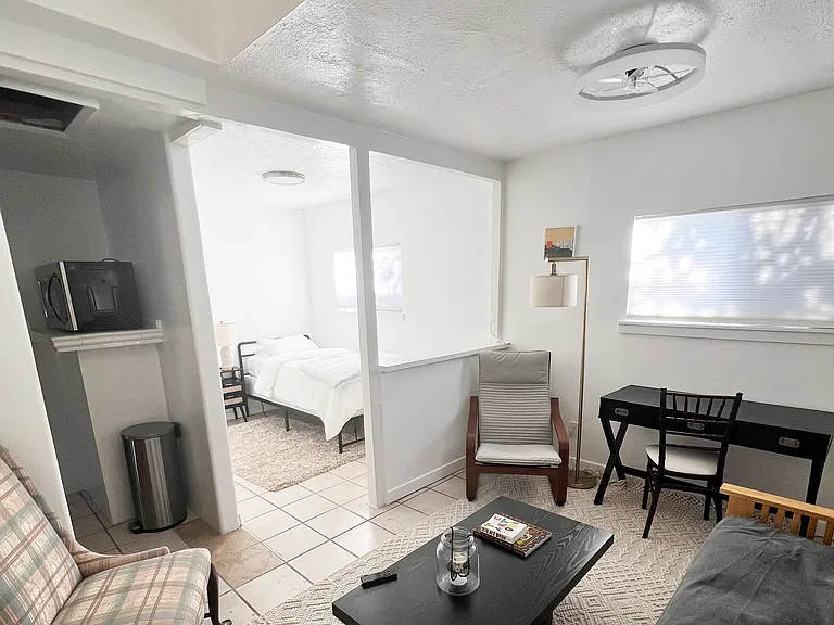 Living Area - rooms do not have doors to allow natural light in a small space.