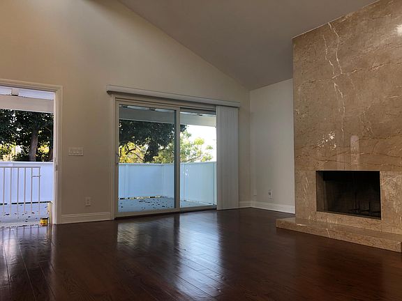 The Living area has sliding doors that lead to the patio that looks toward the Reservoir.