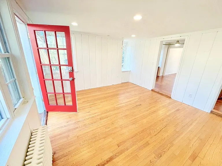 Family room with door out to deck.