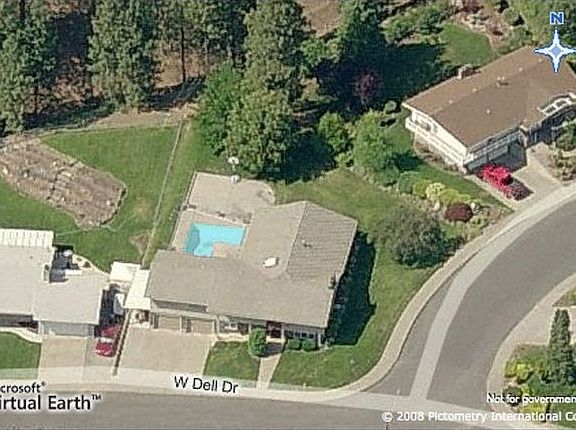 Note large wooded backyard