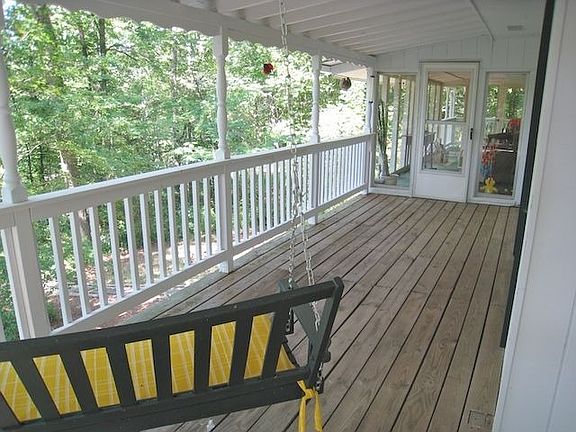Relax in your swing on the wrap around porch.