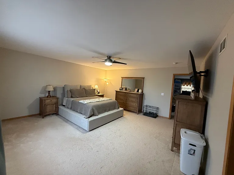 Master bedroom looking from bathroom and closet