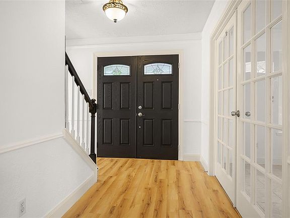 You will love that entryway with the double doors! This is looking from the Family Room.