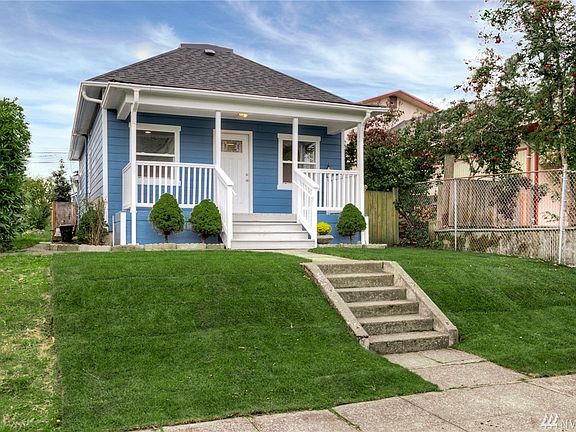 Inviting Over-Sized Pillared Porch
