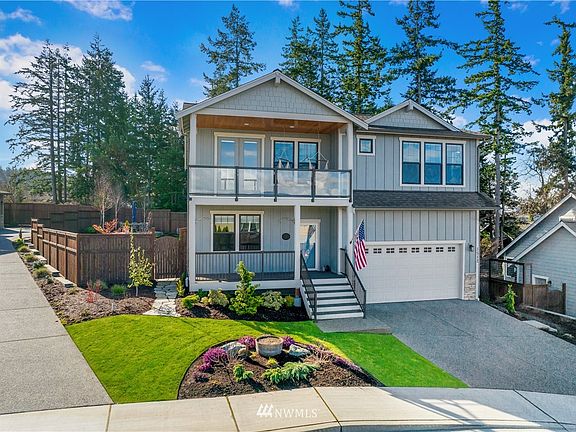 Another street view showing the manicured yard, fully fenced backyard with full yard irrigation. 