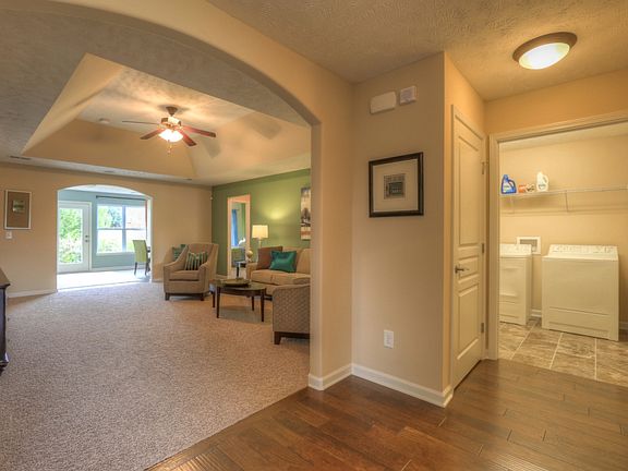 The Charleston Foyer and Great Room This is a model representation, not the actual home