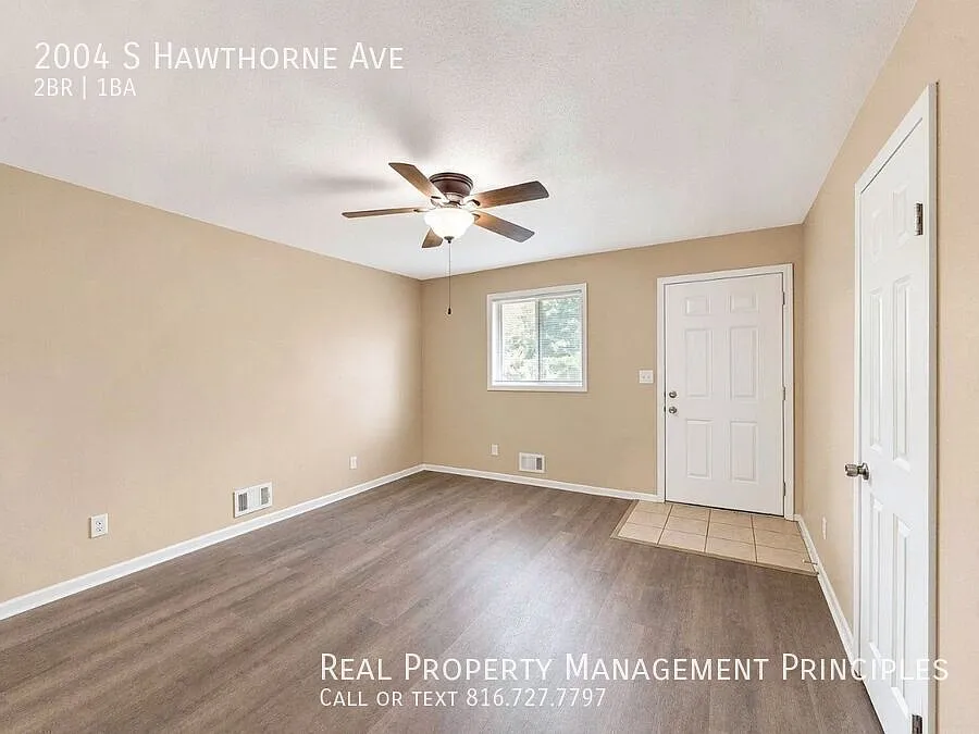 Completely Remodeled 2 Bedroom 1 Bath Townhouse with Maintenance Free Lawn! Deposit Free Living A... — Photo 2
