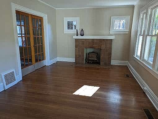 living room with gas firepla