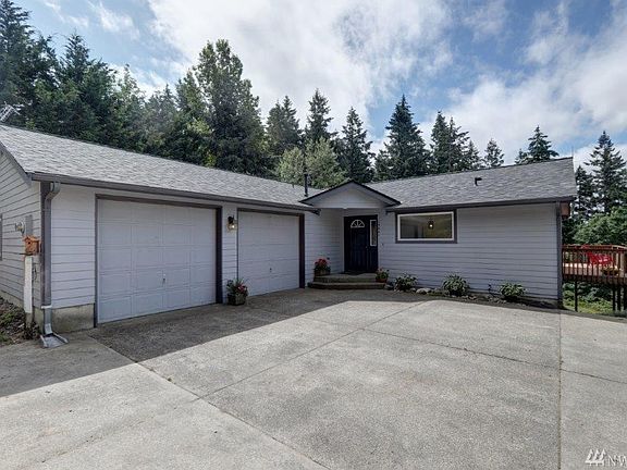 Fabulous Basement Rambler with 2 car garage plus shop (750 sq ft.)  