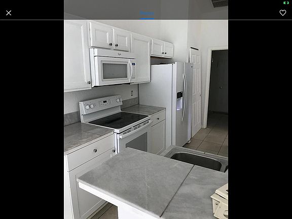 New tiled kitchen tops and cabinets