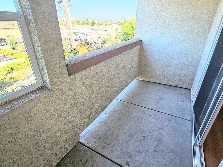 Balcony off living room, outlet for electric grill (max 110 volts)
