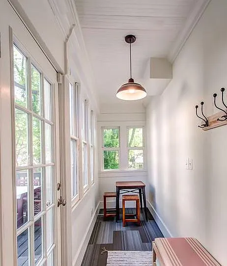 Sunny little room leading out to back deck