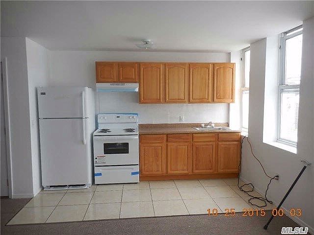 2nd image of 8710 Rockaway Beach Blvd #1