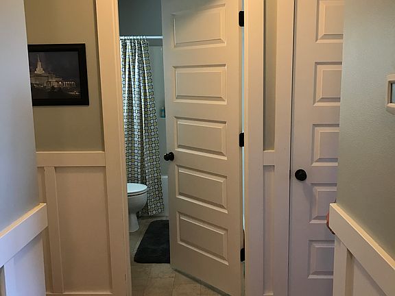 Hallway to east w/ 2 rooms