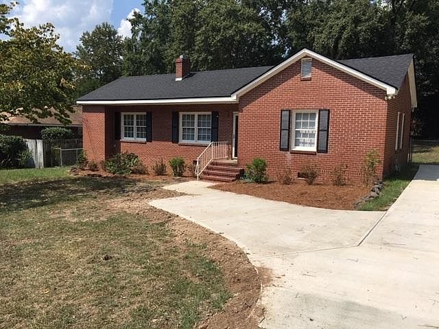 fresh new concrete driveway for easy entrance/exit