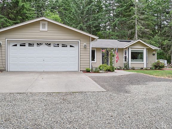 2 car garage with extra space and lots of parking on side of house for the TOYS..... RV BOAT and more