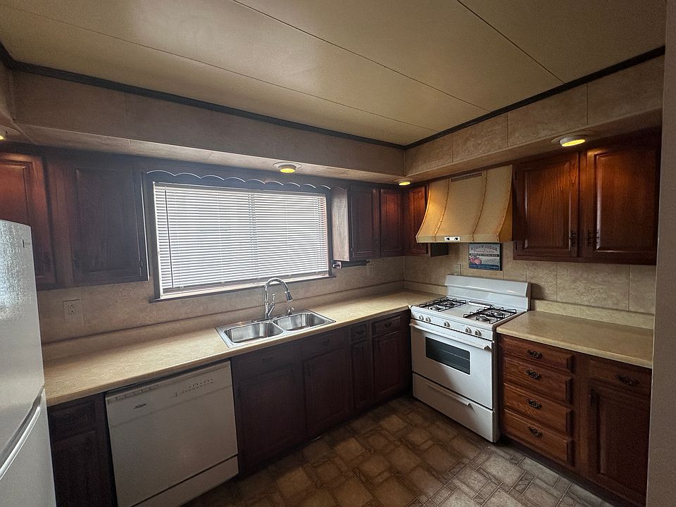 Kitchen with included appliances and tons of storage.