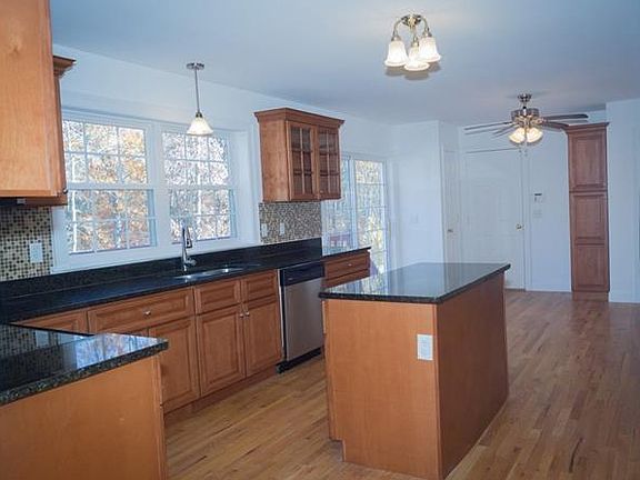 Kitchen overlooks the backy...