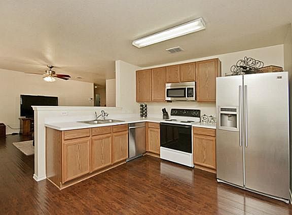 Large kitchen with open concept floor plan.