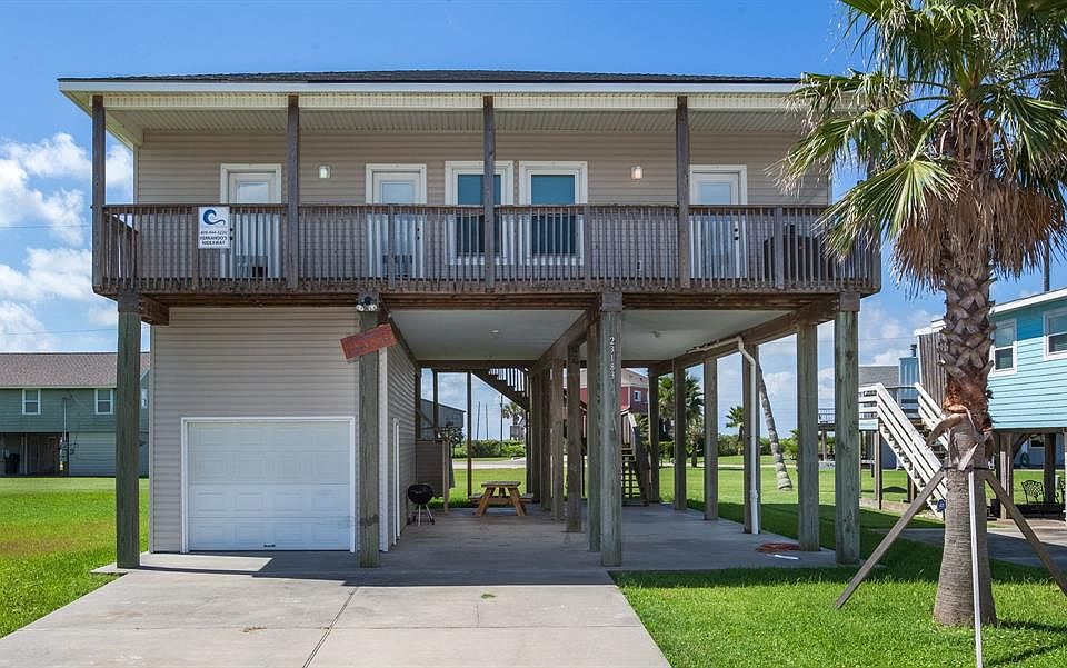 Front of home with nice large deck. Two back bedrooms face out this way with entrances to the deck.