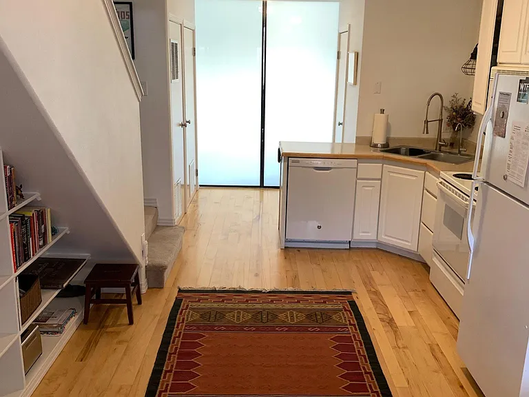 Open floor plan on main level. (Shown with frosted barn doors closed)