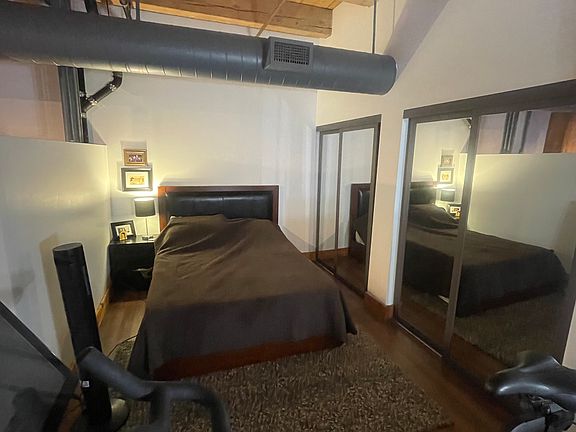 Bedroom with dual closets