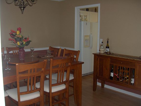Formal Dining Room w/ Doorway to Kitchen
