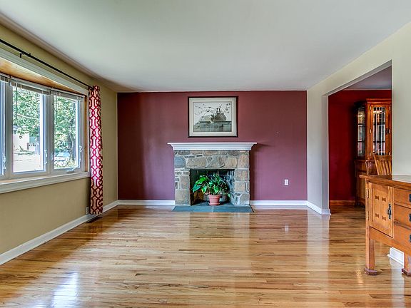 Living room with beautiful stone fireplace