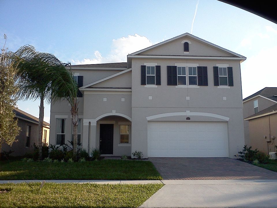 House front. Garage for 2 cars. Master bedroom on top of the garage.