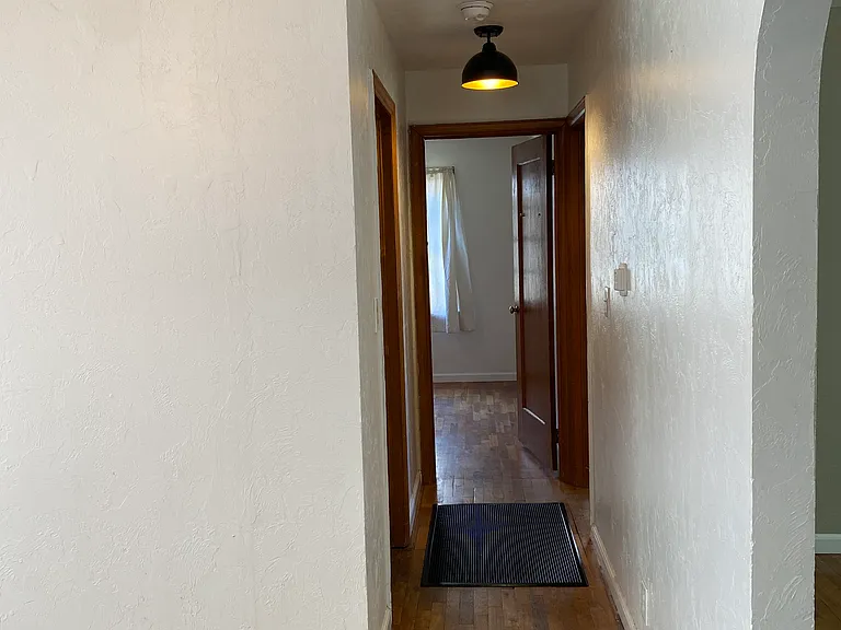 Hallway to bathroom #1, bedrooms #1 and #2