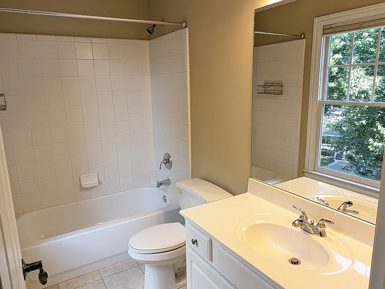 Ensuite bathroom off of mini master bedroom.
