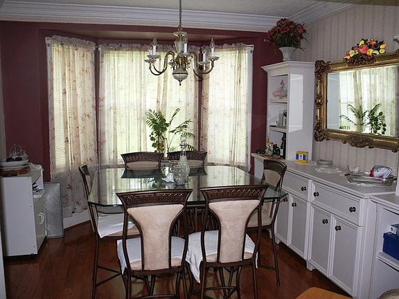 DINING WITH BUILT-INS, WOOD FLOORING THROUGHOUT THE HOUSE