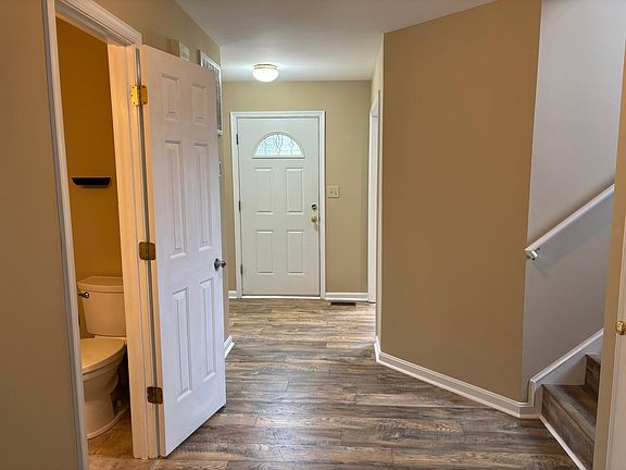 Front door entry space and downstairs half bath.