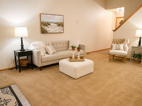 Family room with high ceilings and plenty of light.