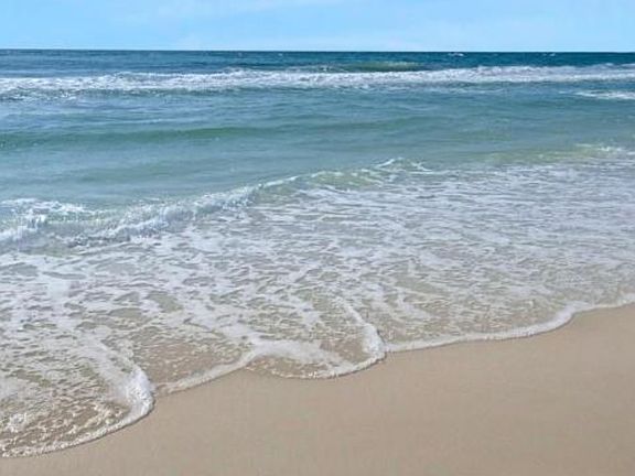 This is the view at the end of the short private boardwalk. No, we do not fight for sand space! :)